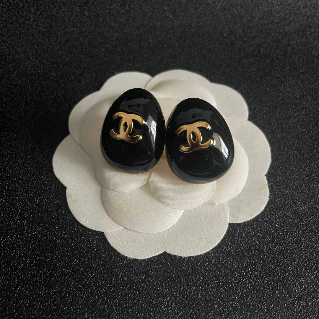 Double-C Emblem Stud Earrings in Polished Metal-Tone – Design 193 front product view