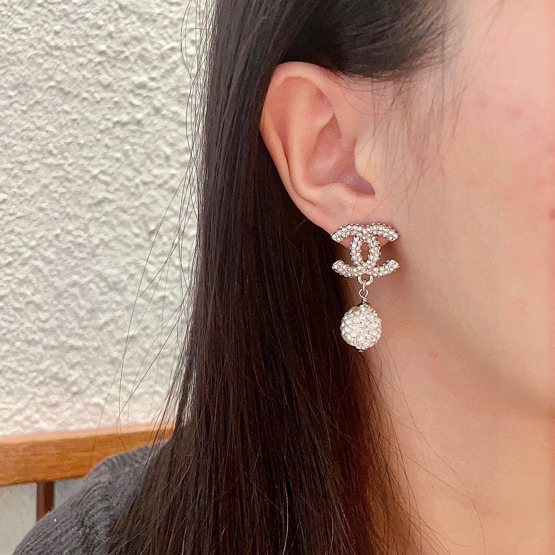 Double-C Emblem Crystal-Accent Statement Earrings – Design 016 detail view