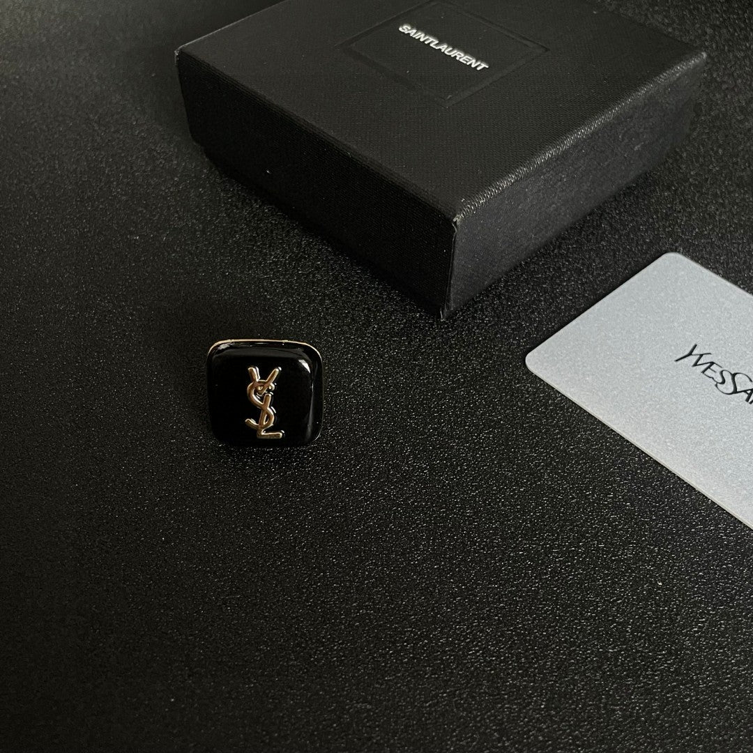 Letter Emblem Statement Ring in Polished Metal-Tone close-up detail