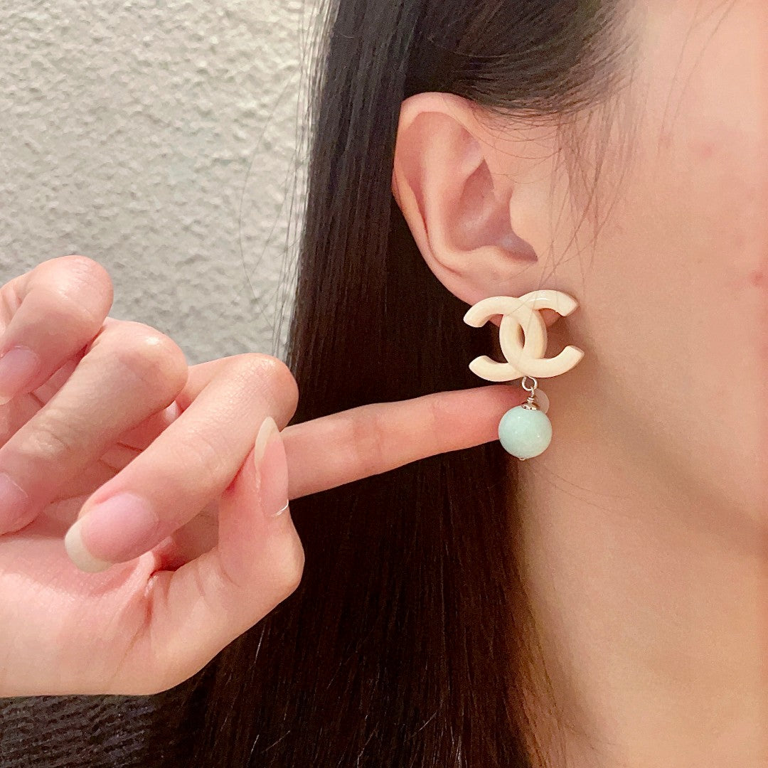 Double-C Emblem Pearl-Detail Statement Earrings – Pearl Detail – Design 008 front product view
