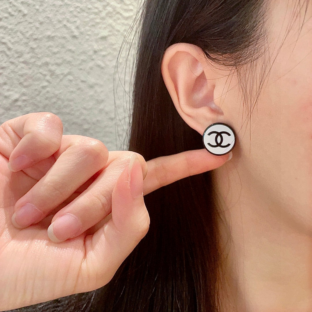 Double-C Emblem Stud Earrings in Polished Metal-Tone – Design 155 front product view