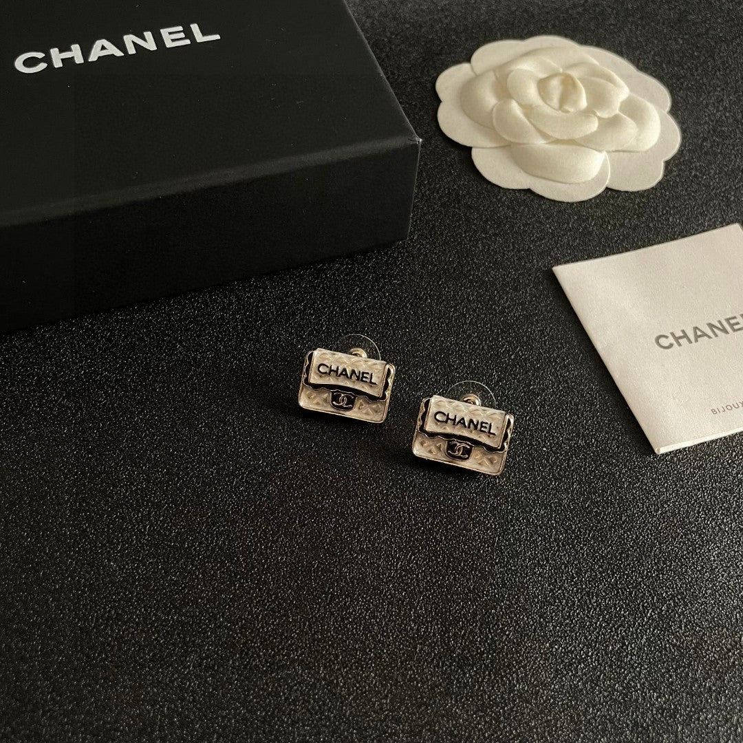 Double-C Emblem Stud Earrings in Polished Metal-Tone – Design 152 styled product view