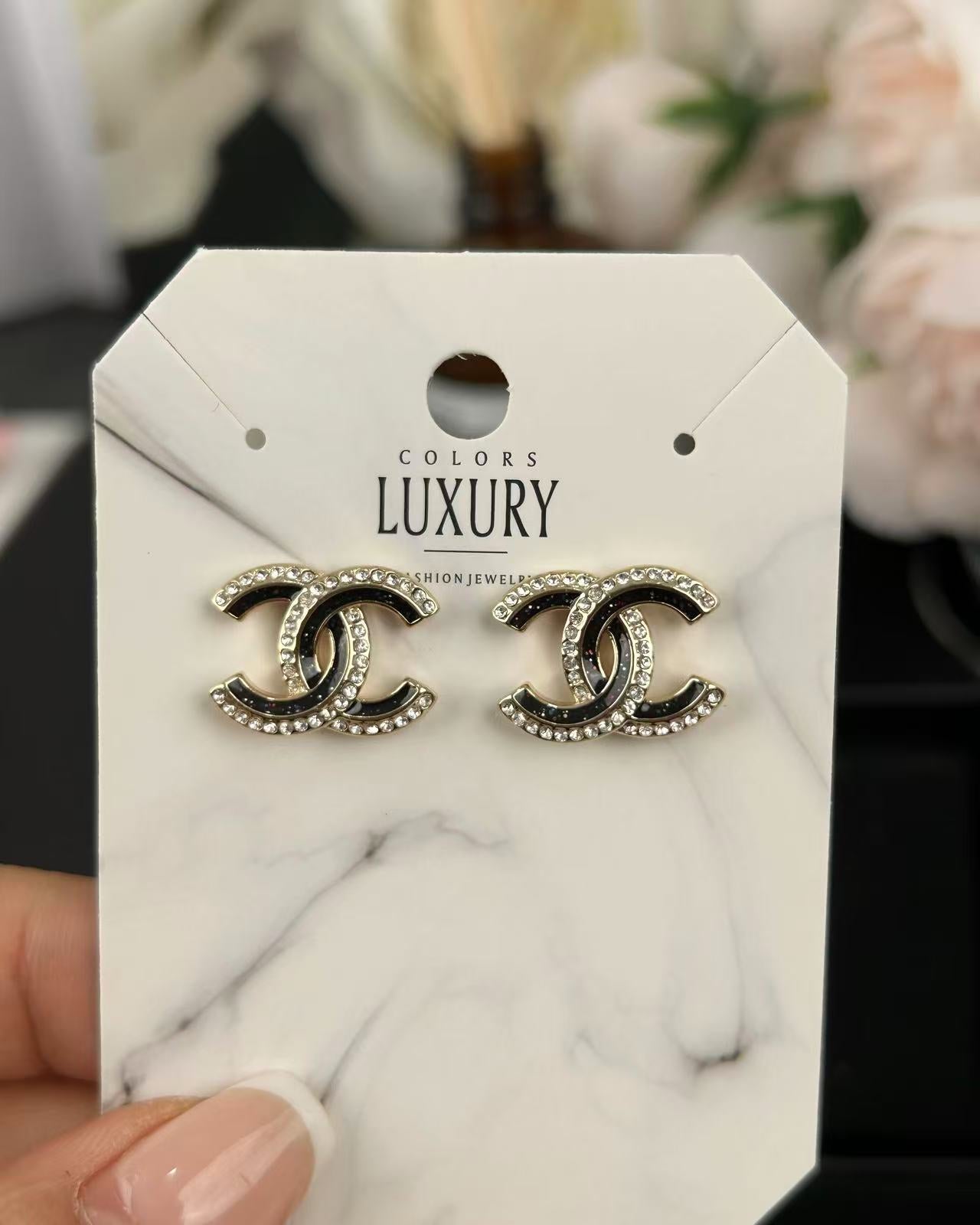 Signature Emblem Crystal-Accent Stud Earrings – Black Detail front product view