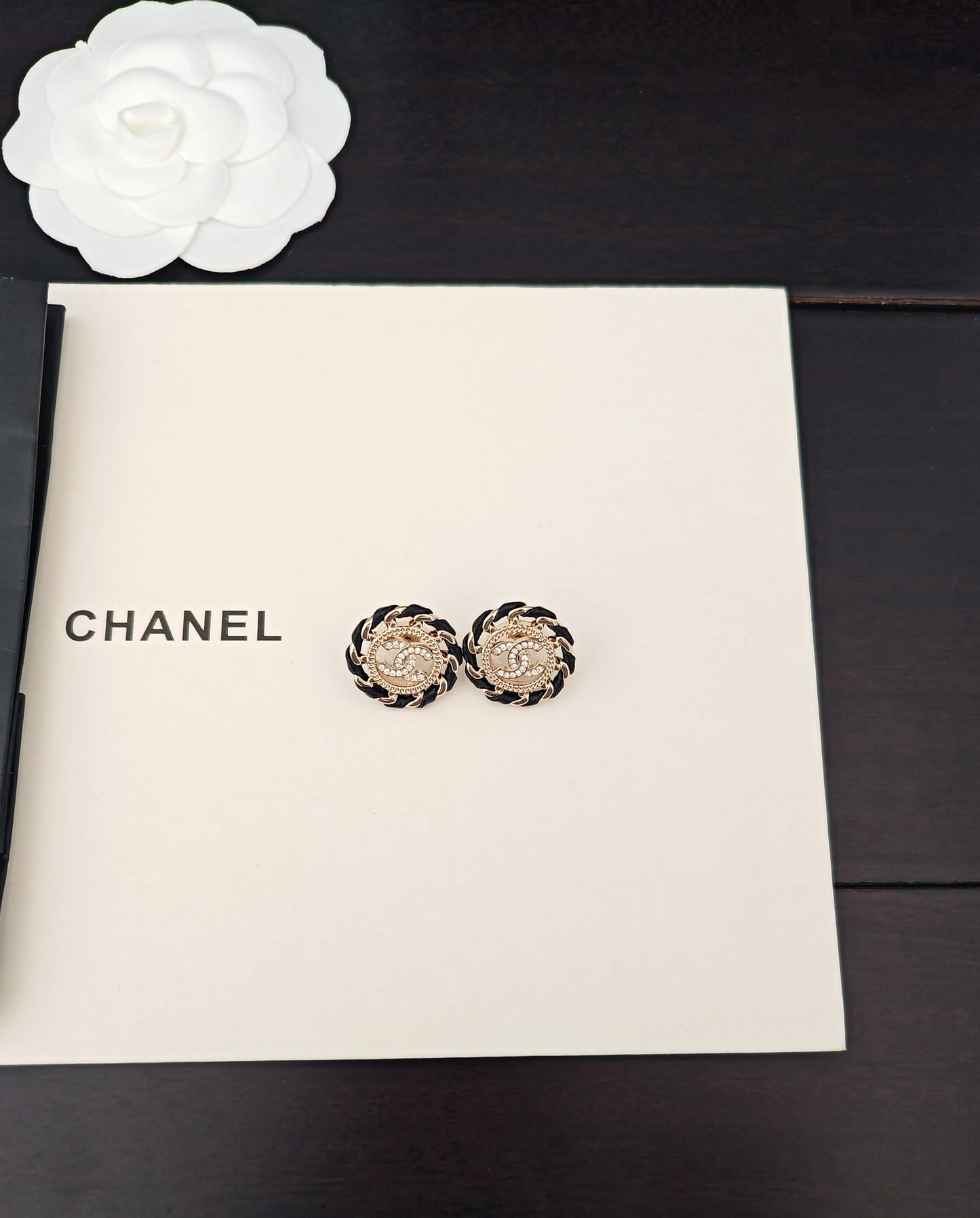 Round Stud Earrings in Gold-Tone – Black Detail close-up detail