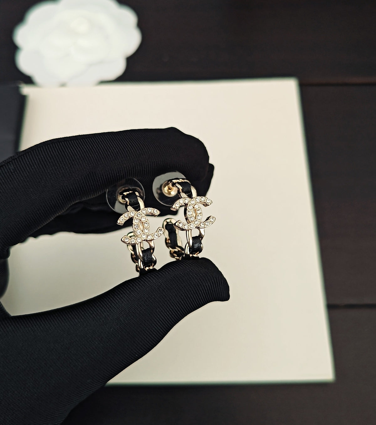 Signature Emblem Jewelry Accessory in Gold-Tone – Black Detail detail view