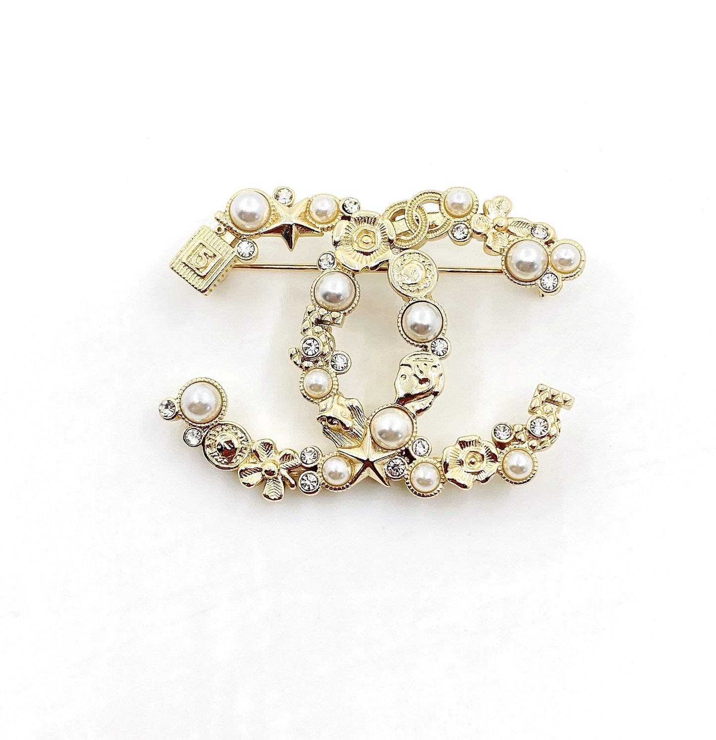 Signature Emblem Brooch in Polished Metal-Tone – Design 009 close-up detail