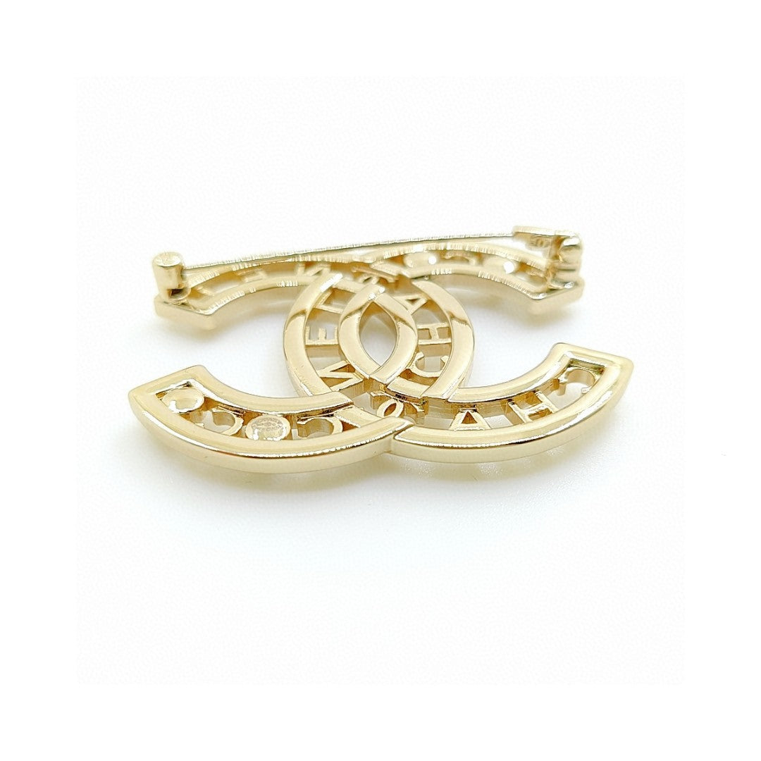 Letter Brooch in Polished Metal-Tone – Pearl Detail detail view