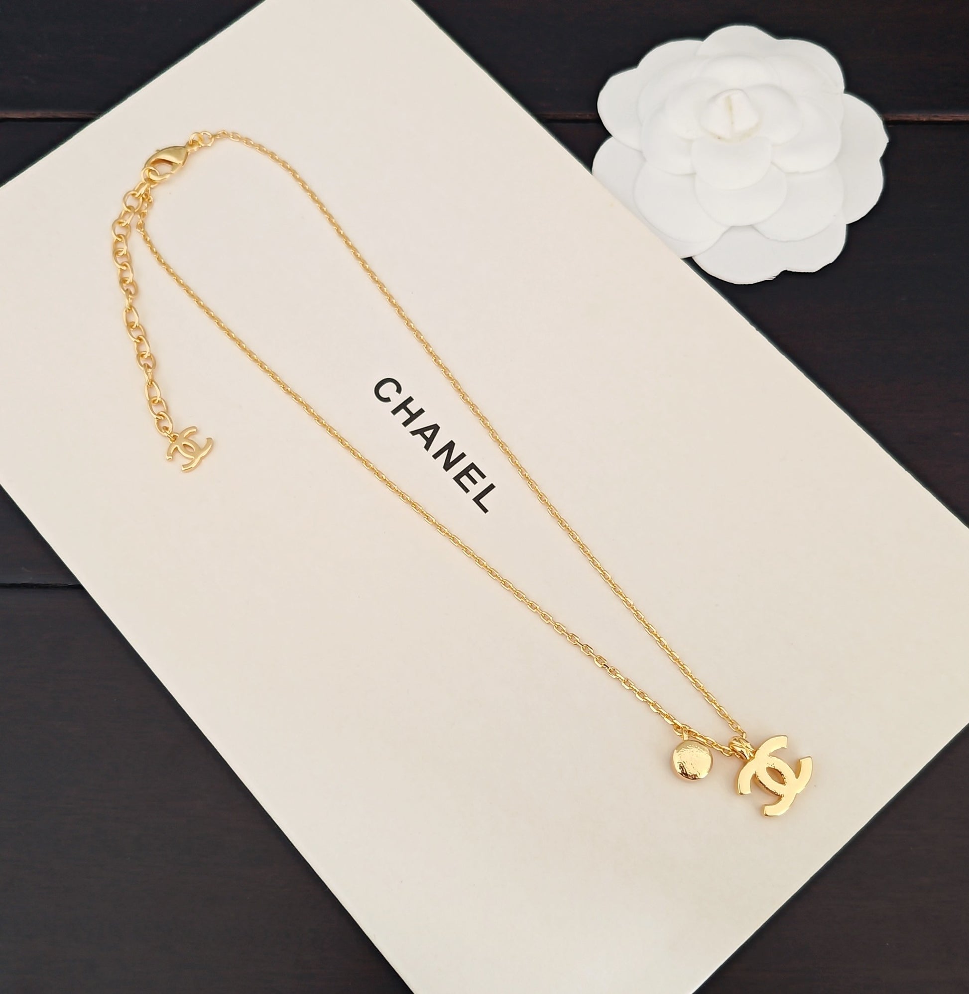 Signature Emblem Crystal-Accent Pendant Necklace – White Detail – Design 002 detail view