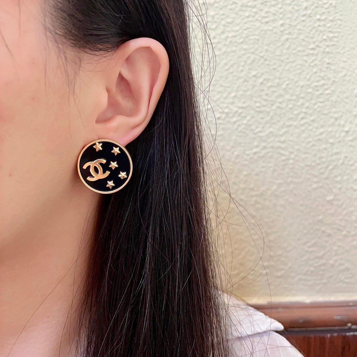 Double-C Emblem Stud Earrings in Polished Metal-Tone – Star Detail – Design 006 detail view