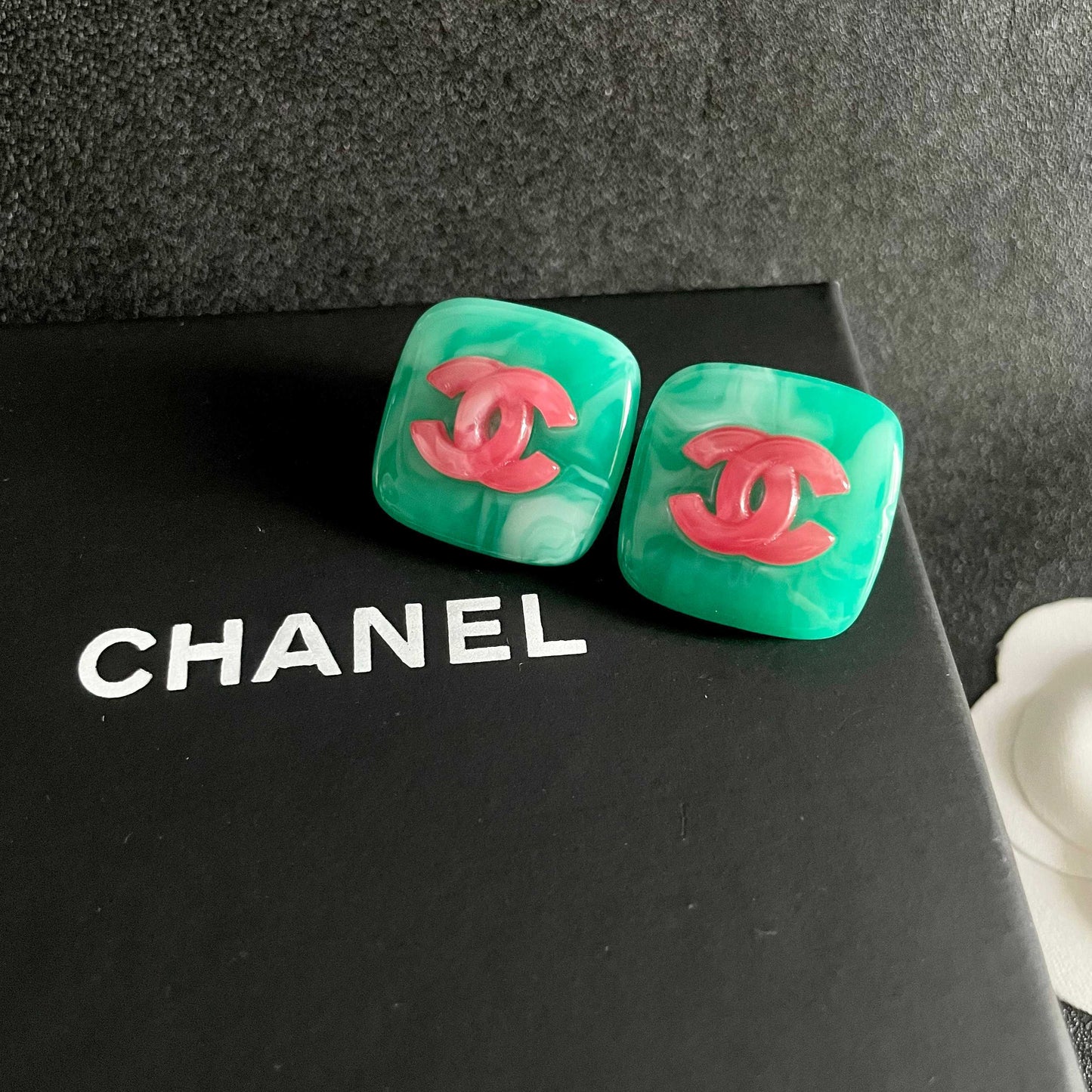 Double-C Emblem Stud Earrings in Polished Metal-Tone – Design 022 detail view