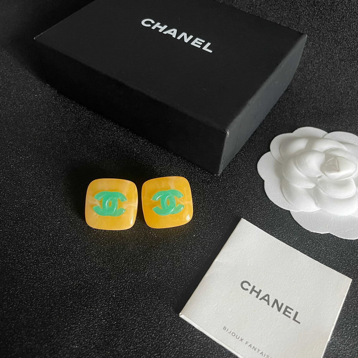 Double-C Emblem Stud Earrings in Polished Metal-Tone – Design 021 close-up detail