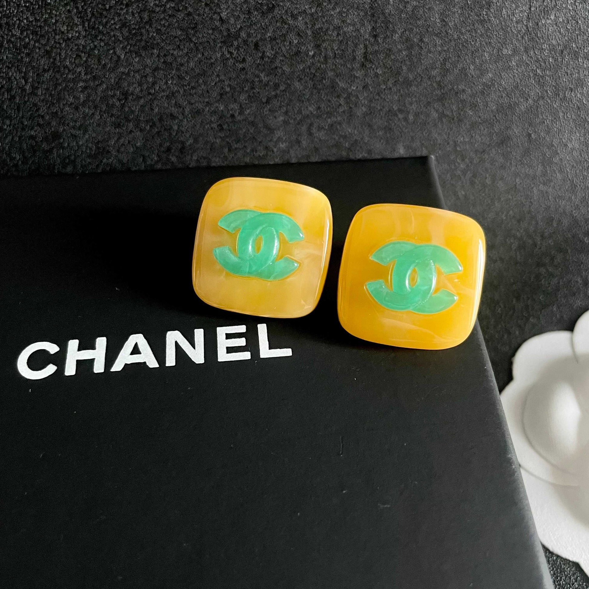 Double-C Emblem Stud Earrings in Polished Metal-Tone – Design 021 detail view