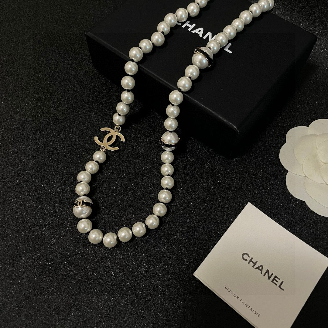 Double-C Emblem Pearl-Detail Pendant Necklace – Pearl Detail – Design 007 styled product view