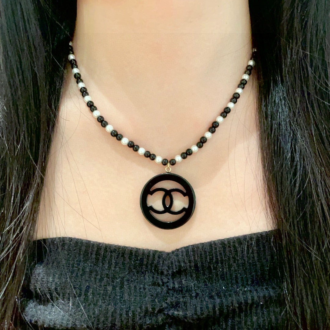Double-C Emblem Pearl-Detail Pendant Necklace – Pearl Detail – Design 006 detail view