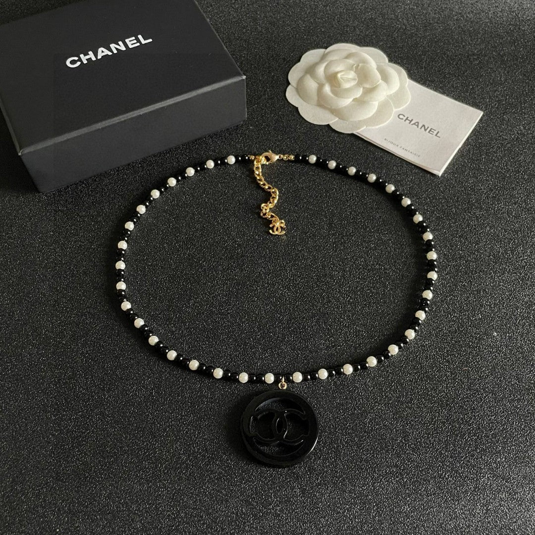 Double-C Emblem Pearl-Detail Pendant Necklace – Pearl Detail – Design 006 detail view