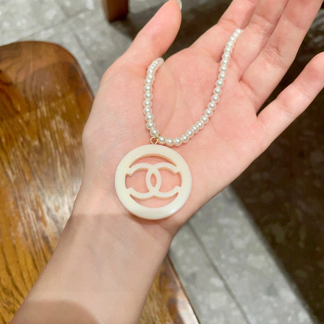 Double-C Emblem Pearl-Detail Pendant Necklace – Pearl Detail – Design 005 side detail