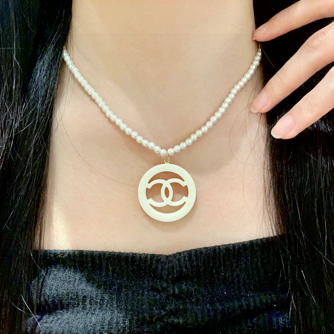 Double-C Emblem Pearl-Detail Pendant Necklace – Pearl Detail – Design 005 main product view