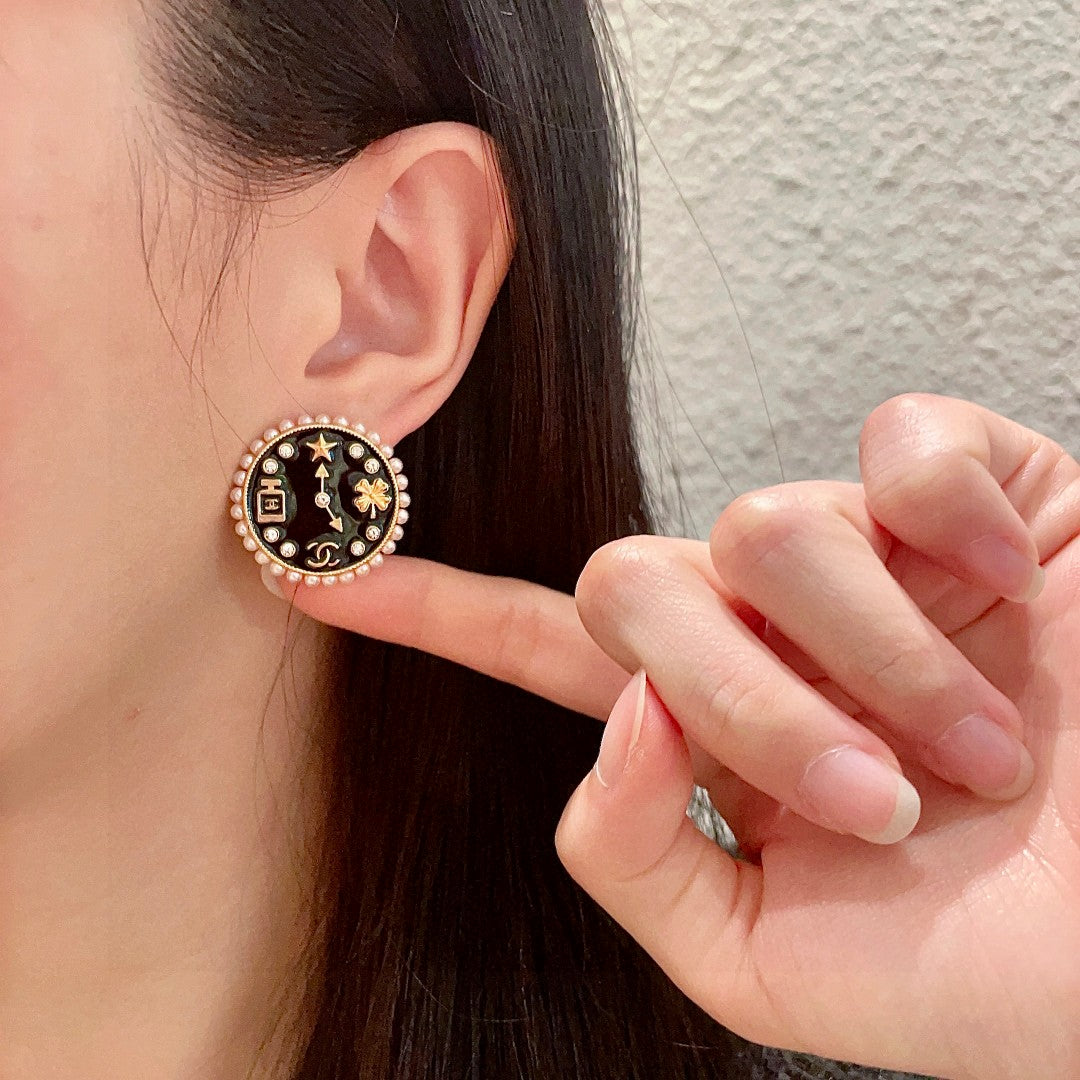 Double-C Emblem Stud Earrings in Polished Metal-Tone – Design 019 front product view