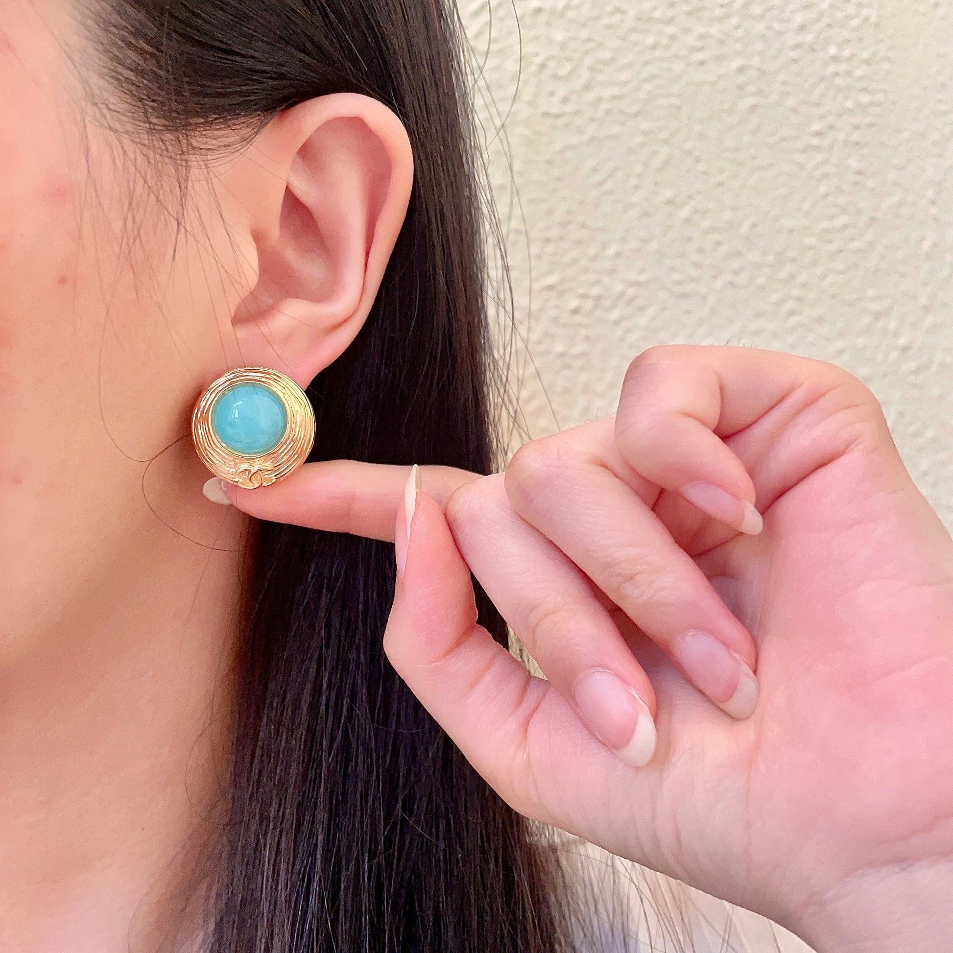 Double-C Emblem Stud Earrings in Polished Metal-Tone – Design 014 front product view