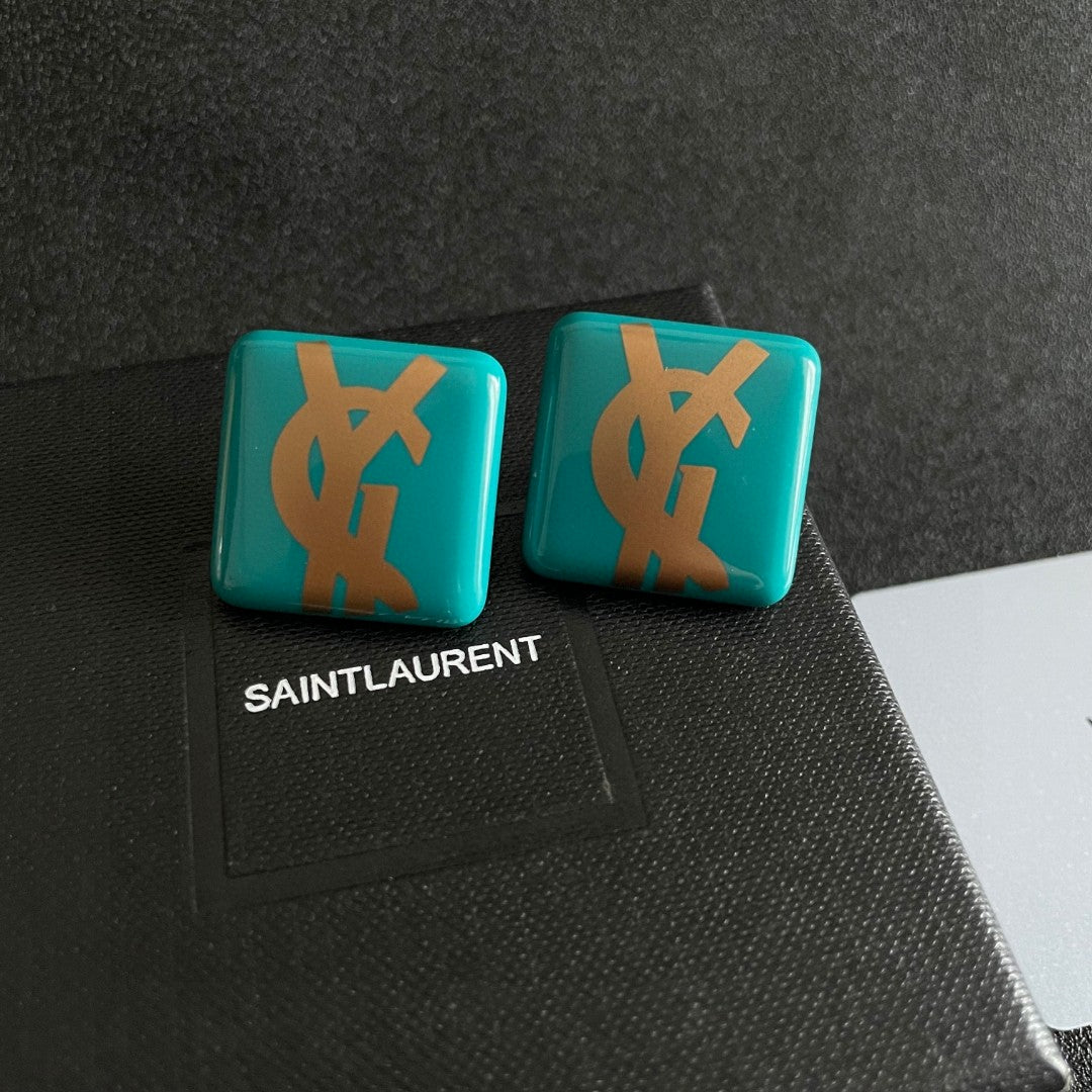 Letter Emblem Stud Earrings in Polished Metal-Tone – Design 013 detail view