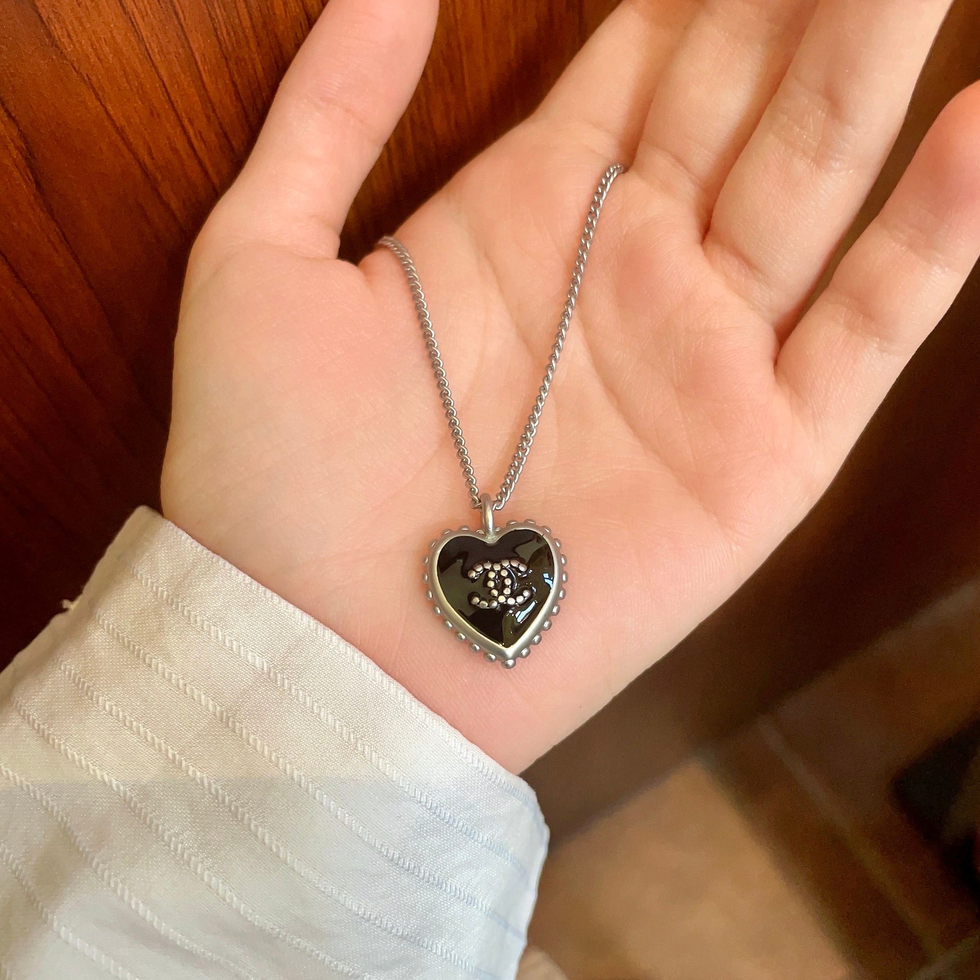 Double-C Emblem Pendant Necklace in Polished Metal-Tone – Heart Detail – Design 003 side detail