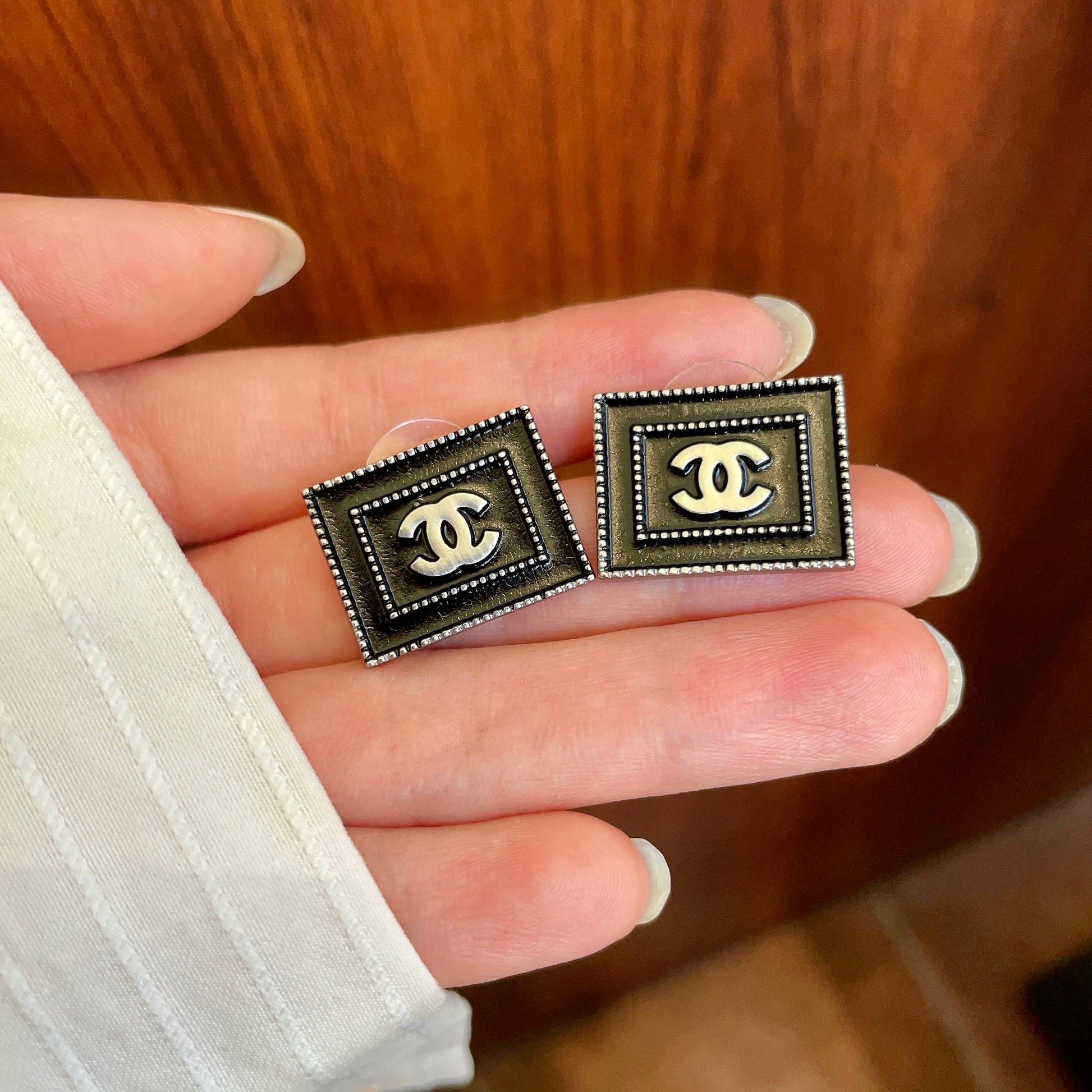 Double-C Emblem Stud Earrings in Polished Metal-Tone – Design 169 side detail