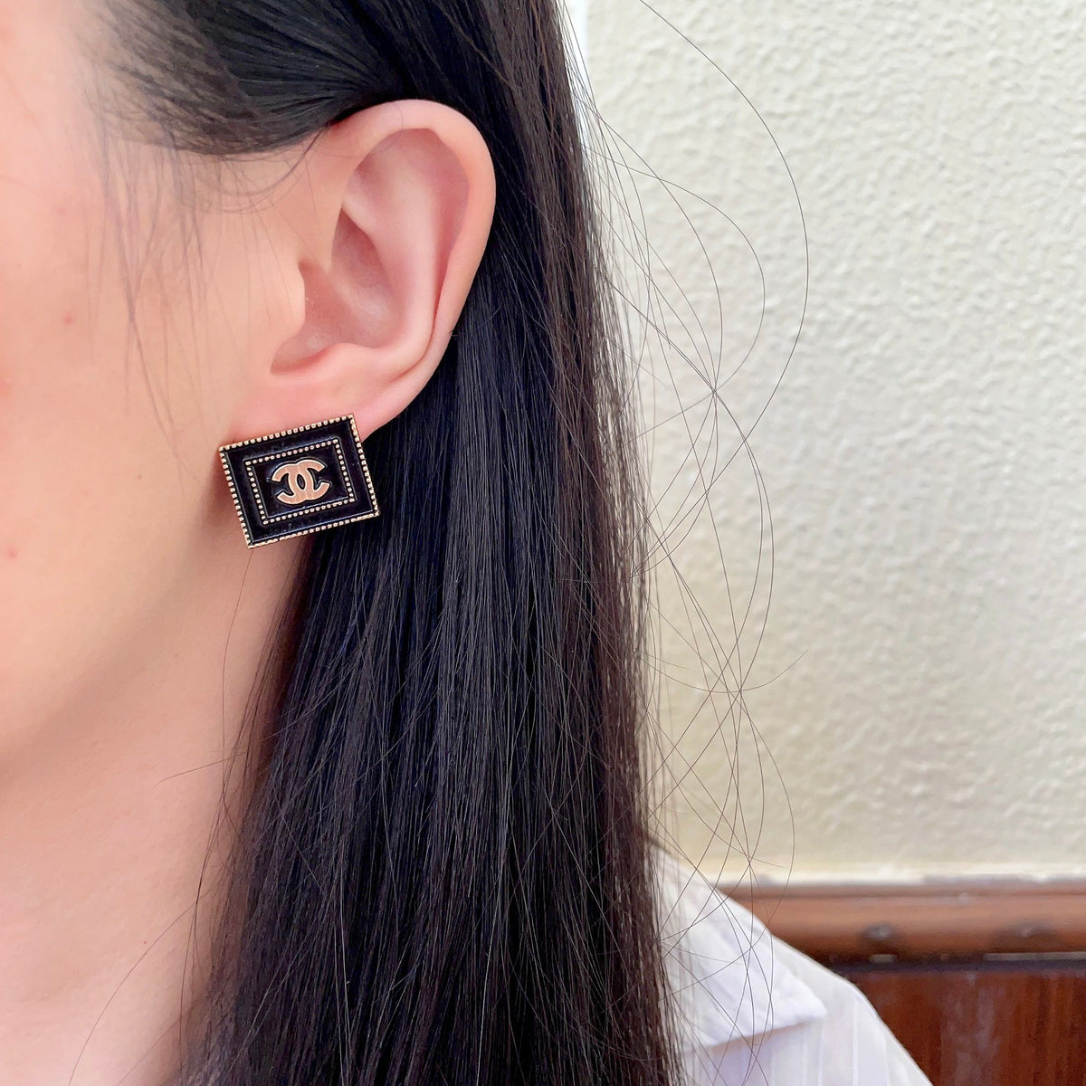 Double-C Emblem Stud Earrings in Polished Metal-Tone – Design 168 detail view