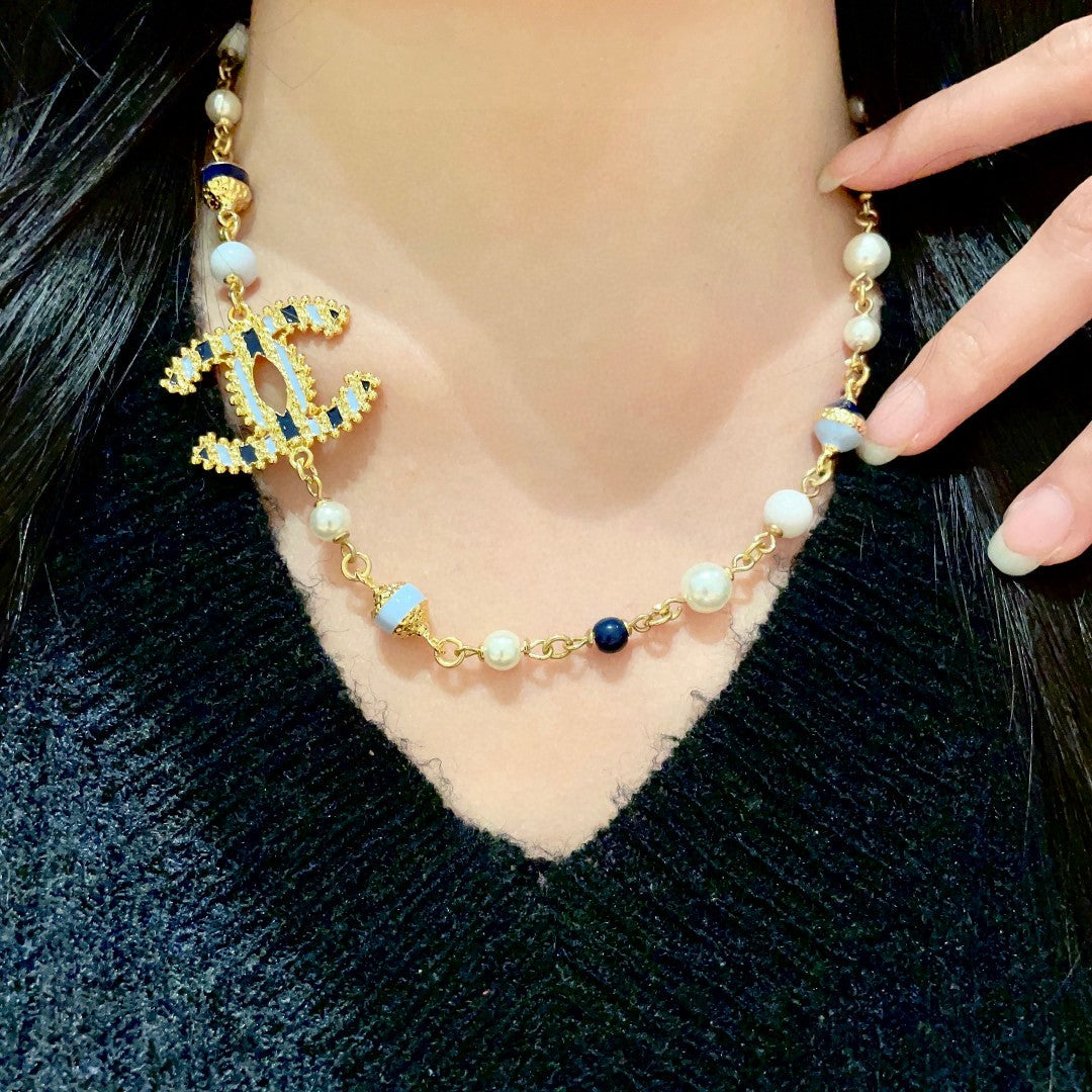 Double-C Emblem Pearl-Detail Pendant Necklace – Pearl Detail – Design 011 detail view