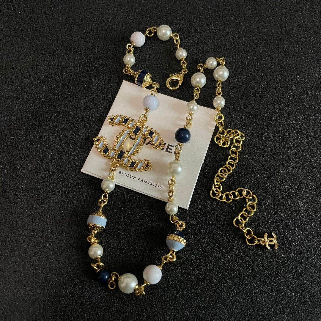 Double-C Emblem Pearl-Detail Pendant Necklace – Pearl Detail – Design 011 close-up detail