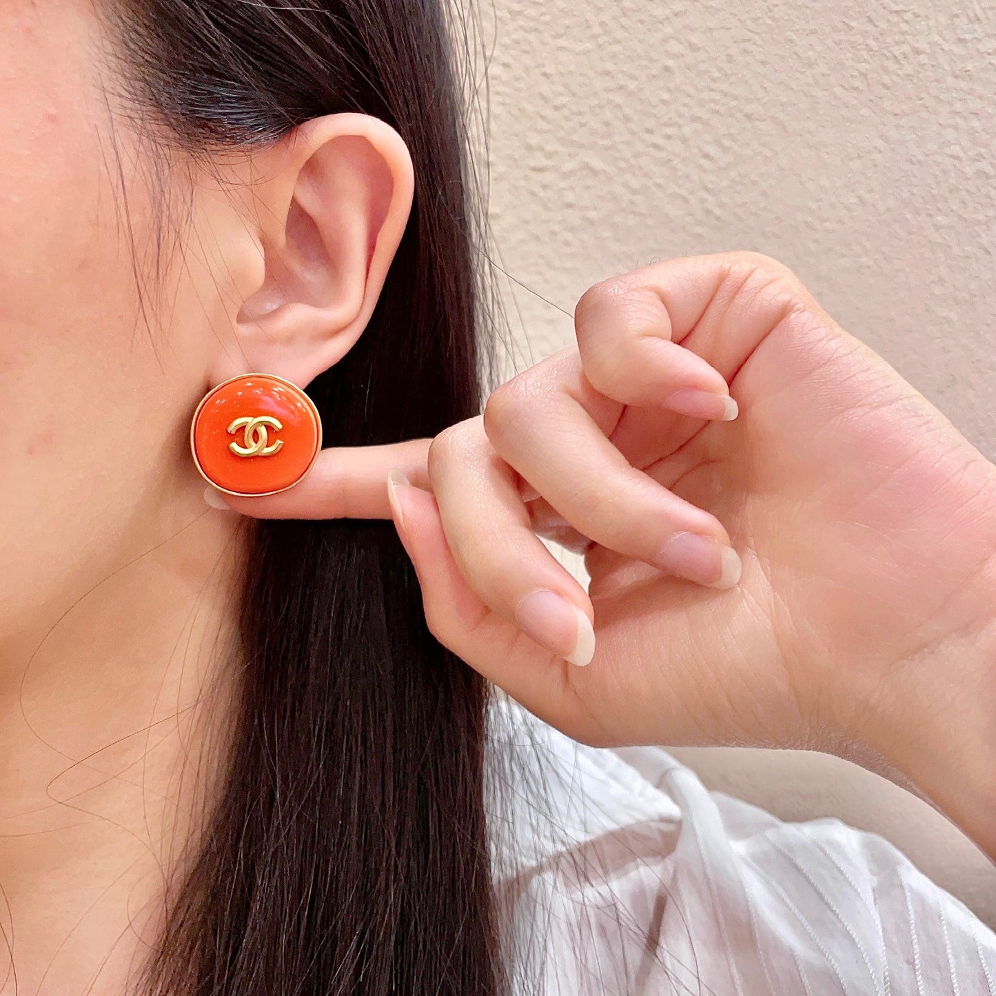 Double-C Emblem Stud Earrings in Polished Metal-Tone – Design 305 front product view