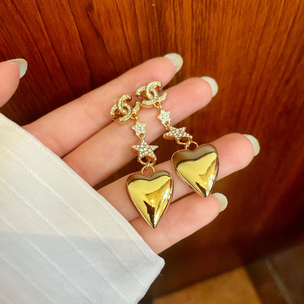 Double-C Emblem Statement Earrings in Polished Metal-Tone – Heart Detail – Design 006 side detail
