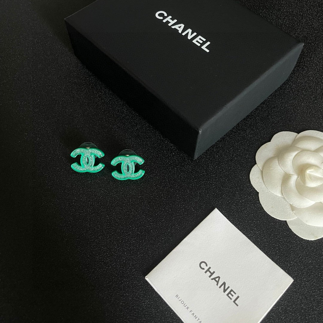 Double-C Emblem Stud Earrings in Polished Metal-Tone – Design 469 close-up detail