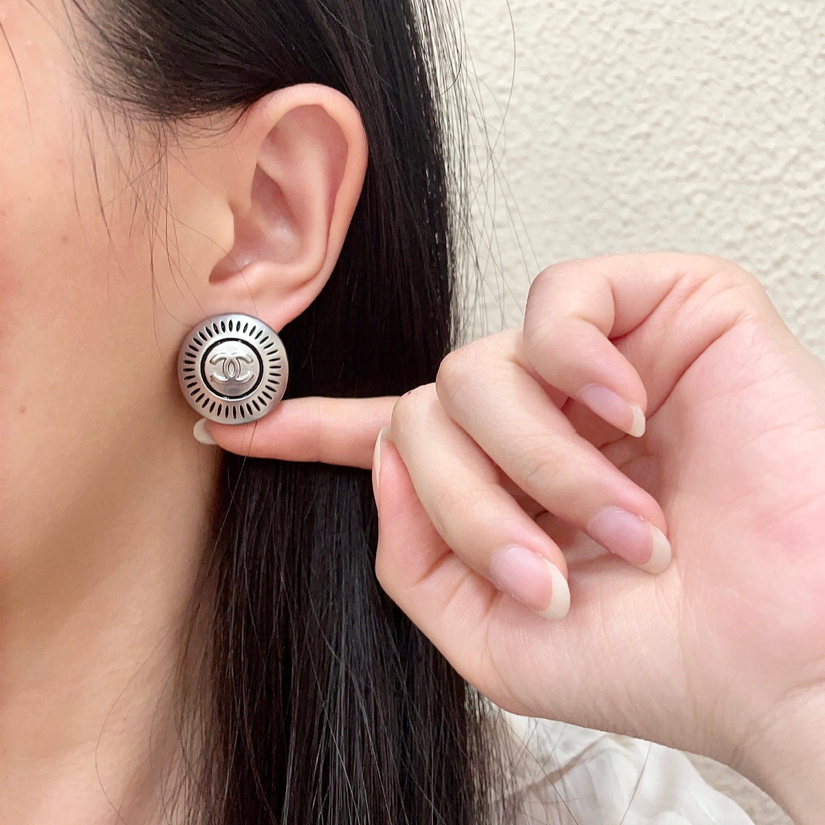 Double-C Emblem Stud Earrings in Polished Metal-Tone – Design 116 front product view