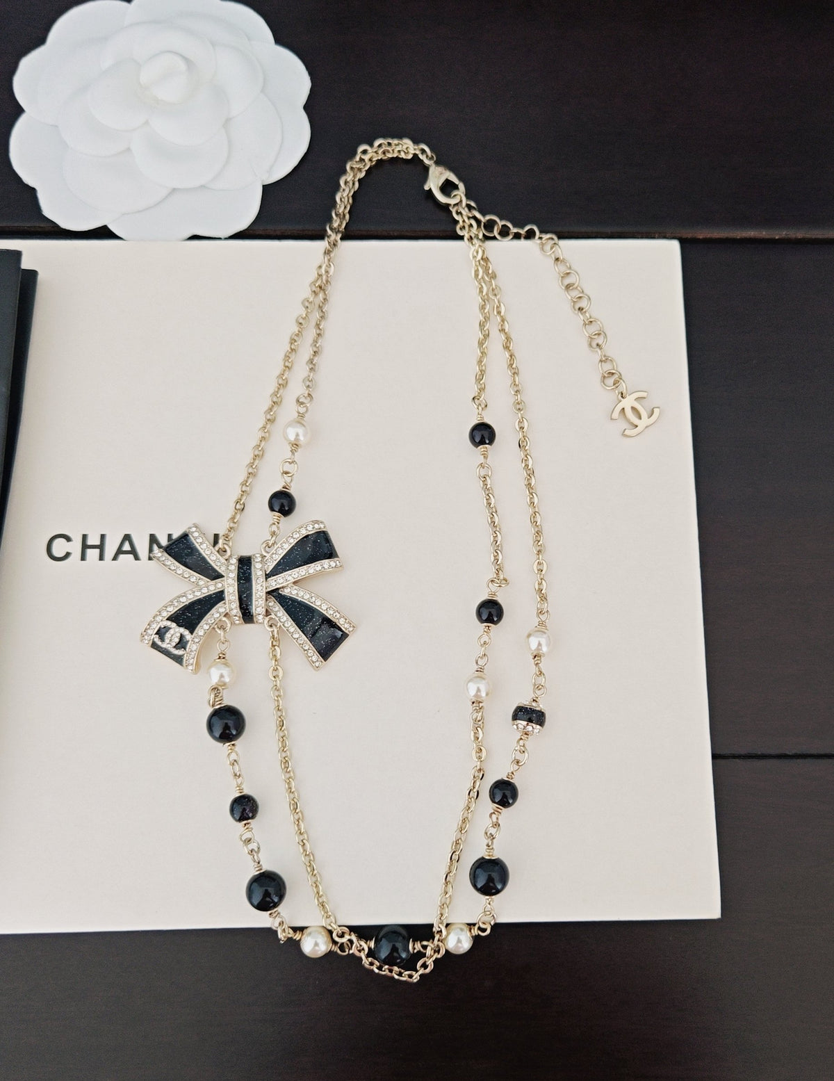 Bow Pendant Necklace in Gold-Tone – Black Detail – Design 003 side detail