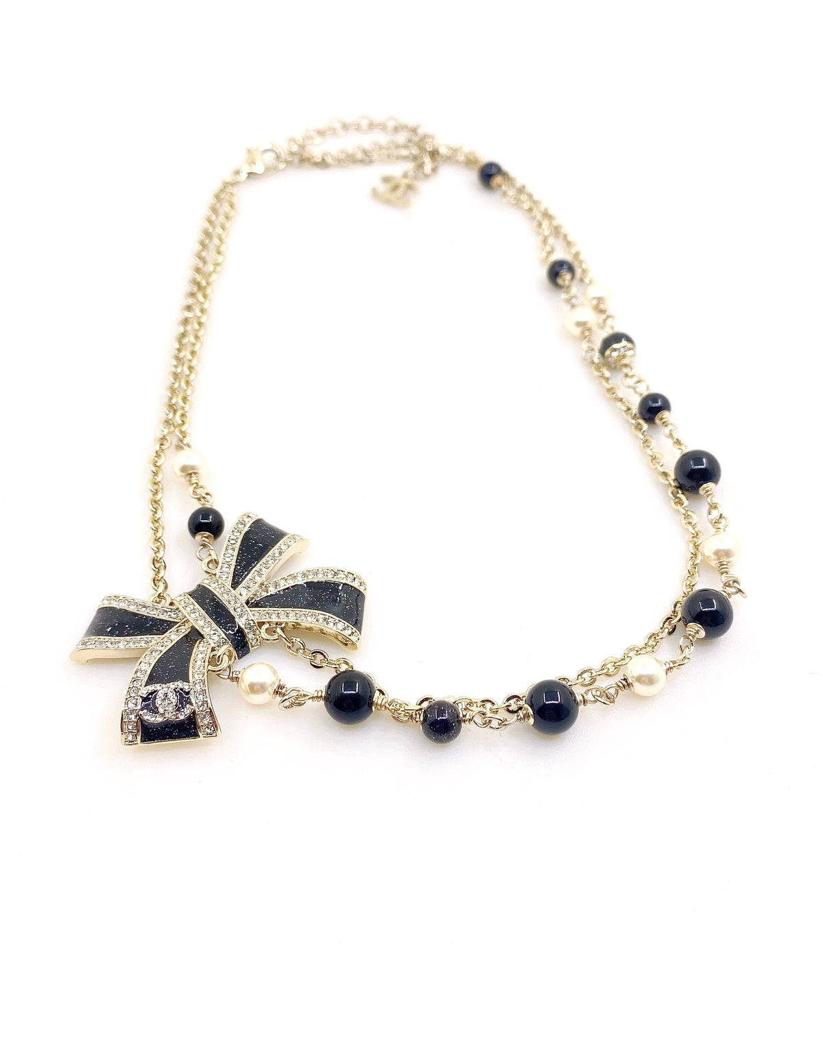 Bow Pendant Necklace in Gold-Tone – Black Detail – Design 002 detail view