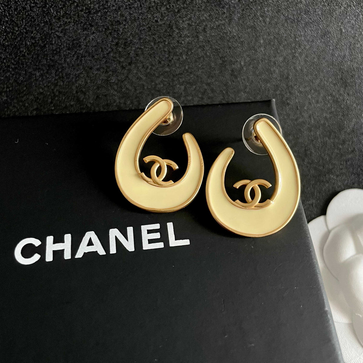 Double-C Emblem Stud Earrings in Polished Metal-Tone – Design 072 detail view