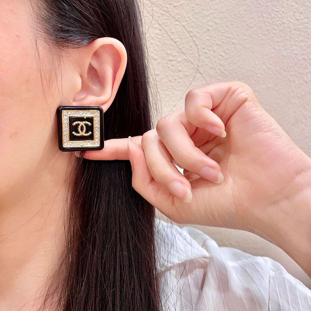 Double-C Emblem Stud Earrings in Polished Metal-Tone – Design 064 front product view