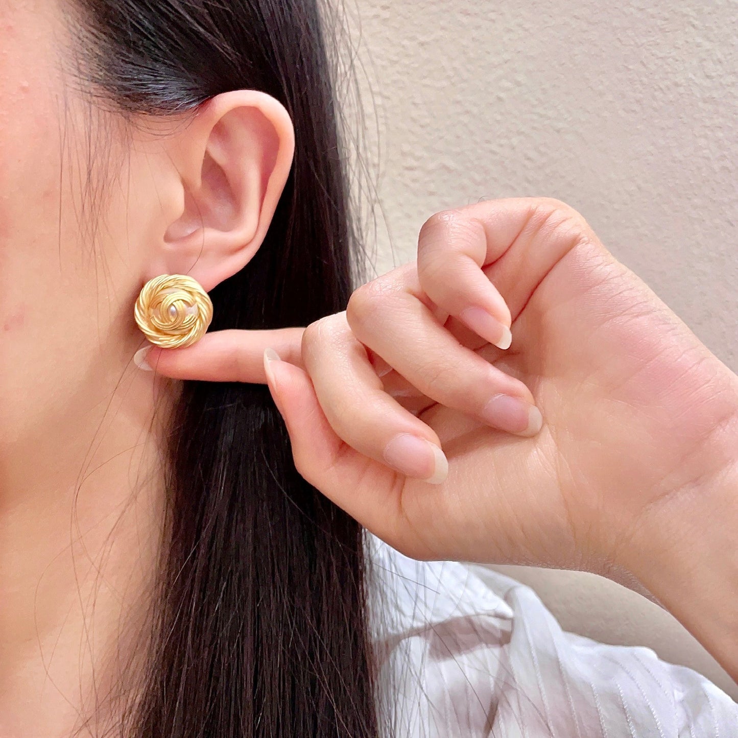 Double-C Emblem Stud Earrings in Polished Metal-Tone – Design 302 front product view