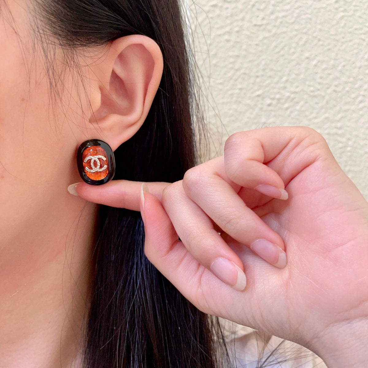 Double-C Emblem Stud Earrings in Polished Metal-Tone – Design 418 front product view