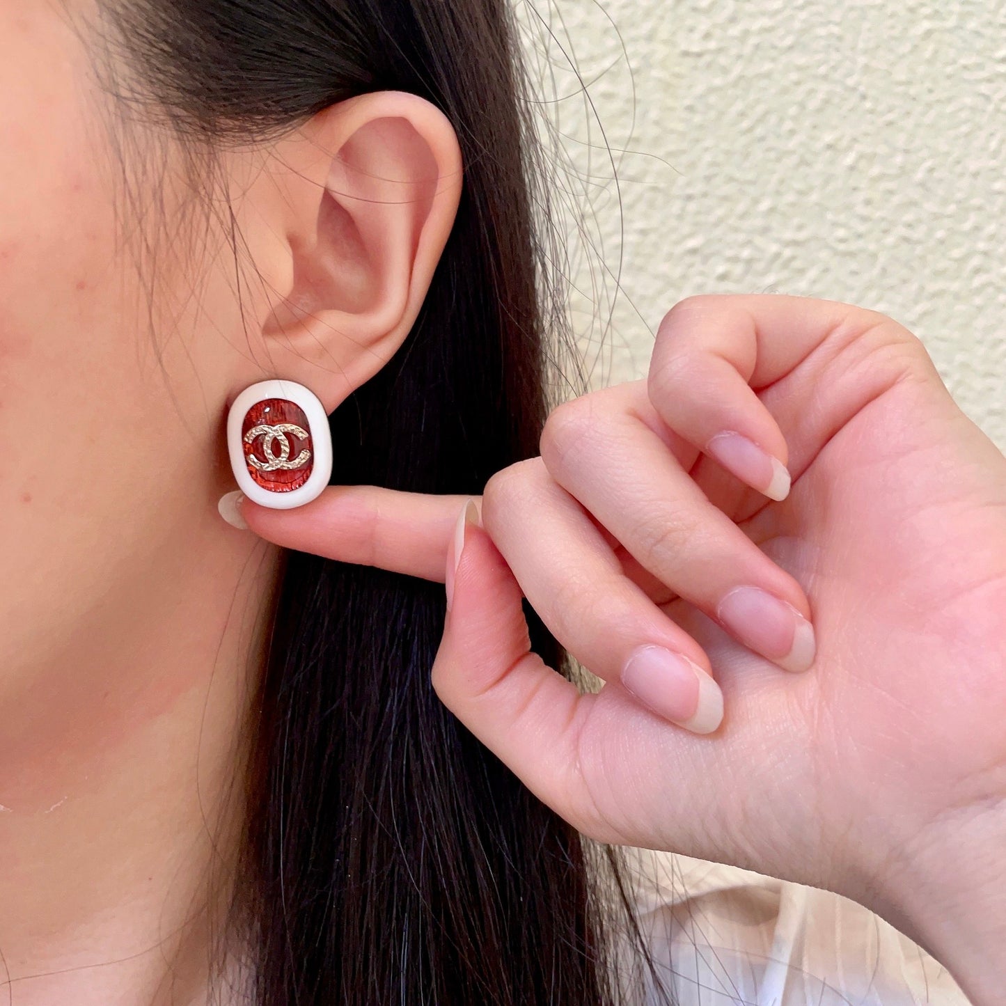 Double-C Emblem Stud Earrings in Polished Metal-Tone – Design 070 front product view