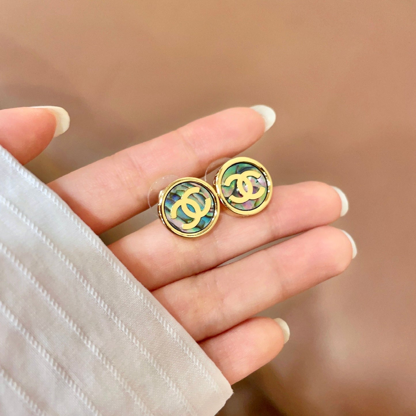 Double-C Emblem Stud Earrings in Polished Metal-Tone – Design 384 side detail