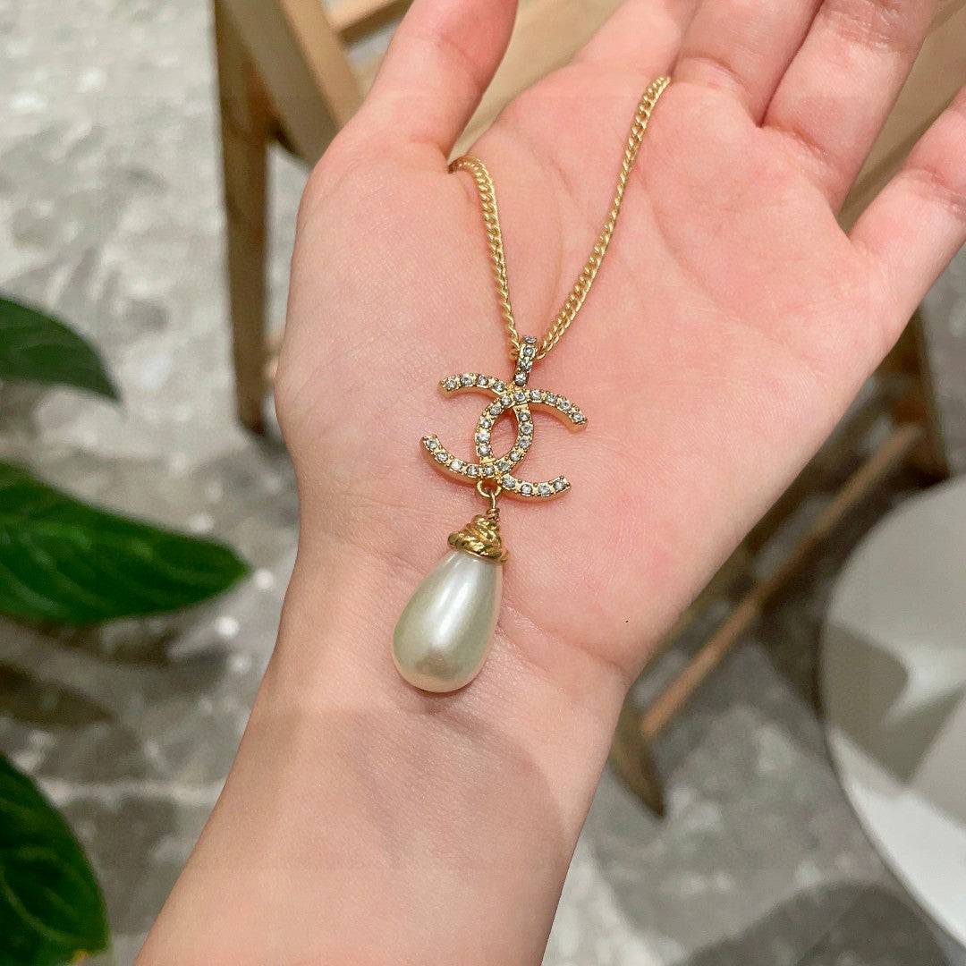 Double-C Emblem Pearl-Detail Pendant Necklace – Pearl Detail – Design 023 side detail