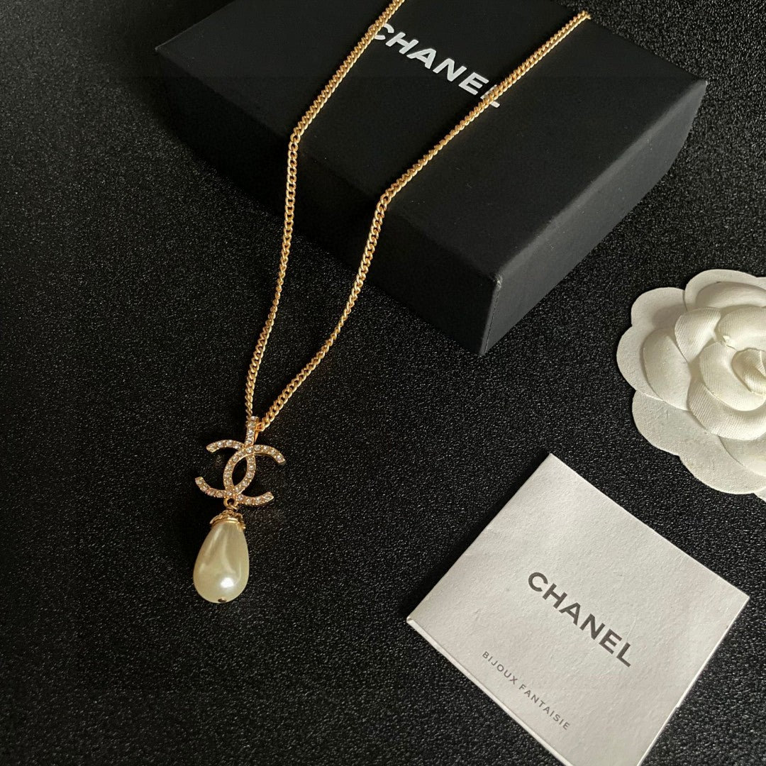 Double-C Emblem Pearl-Detail Pendant Necklace – Pearl Detail – Design 023 close-up detail