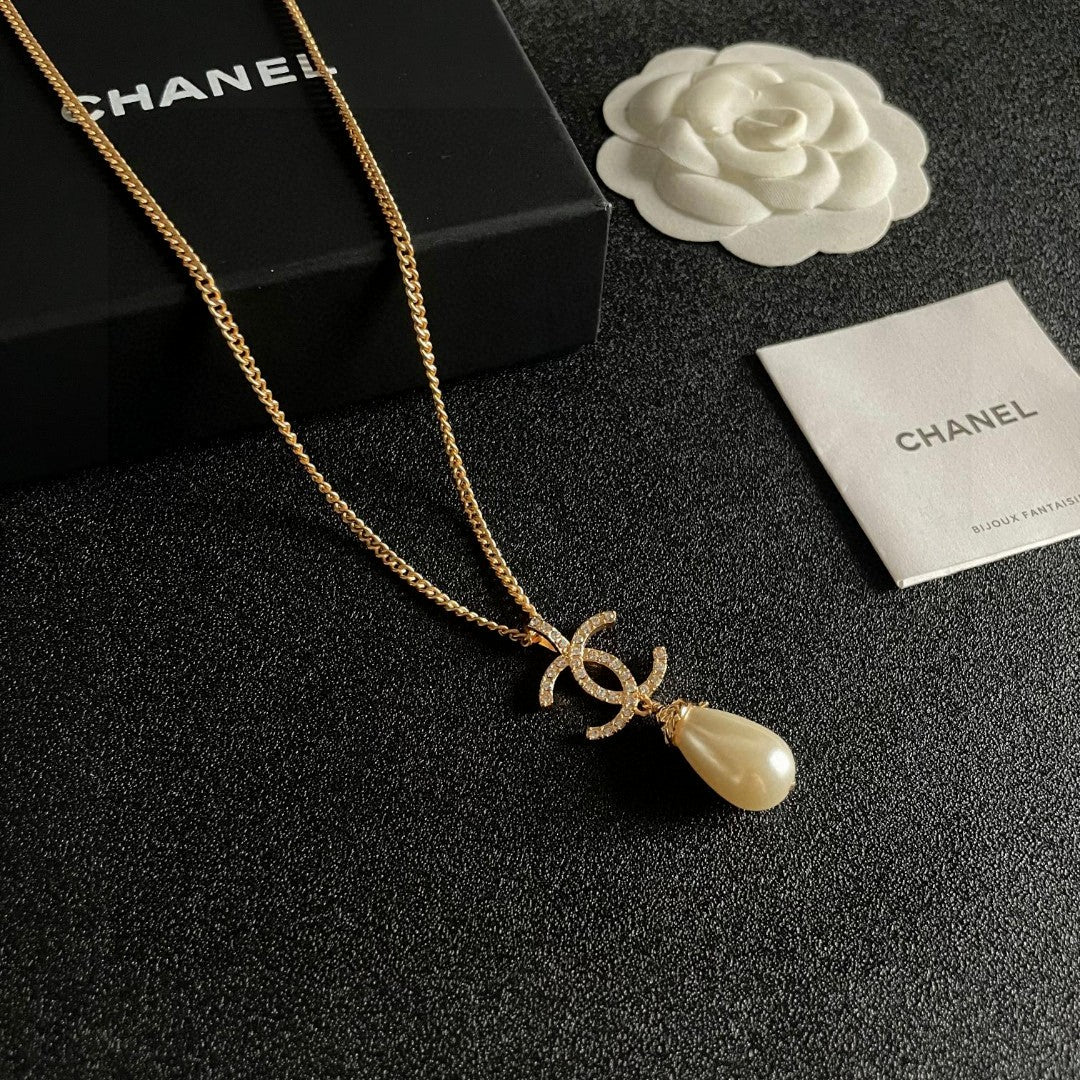 Double-C Emblem Pearl-Detail Pendant Necklace – Pearl Detail – Design 023 styled product view