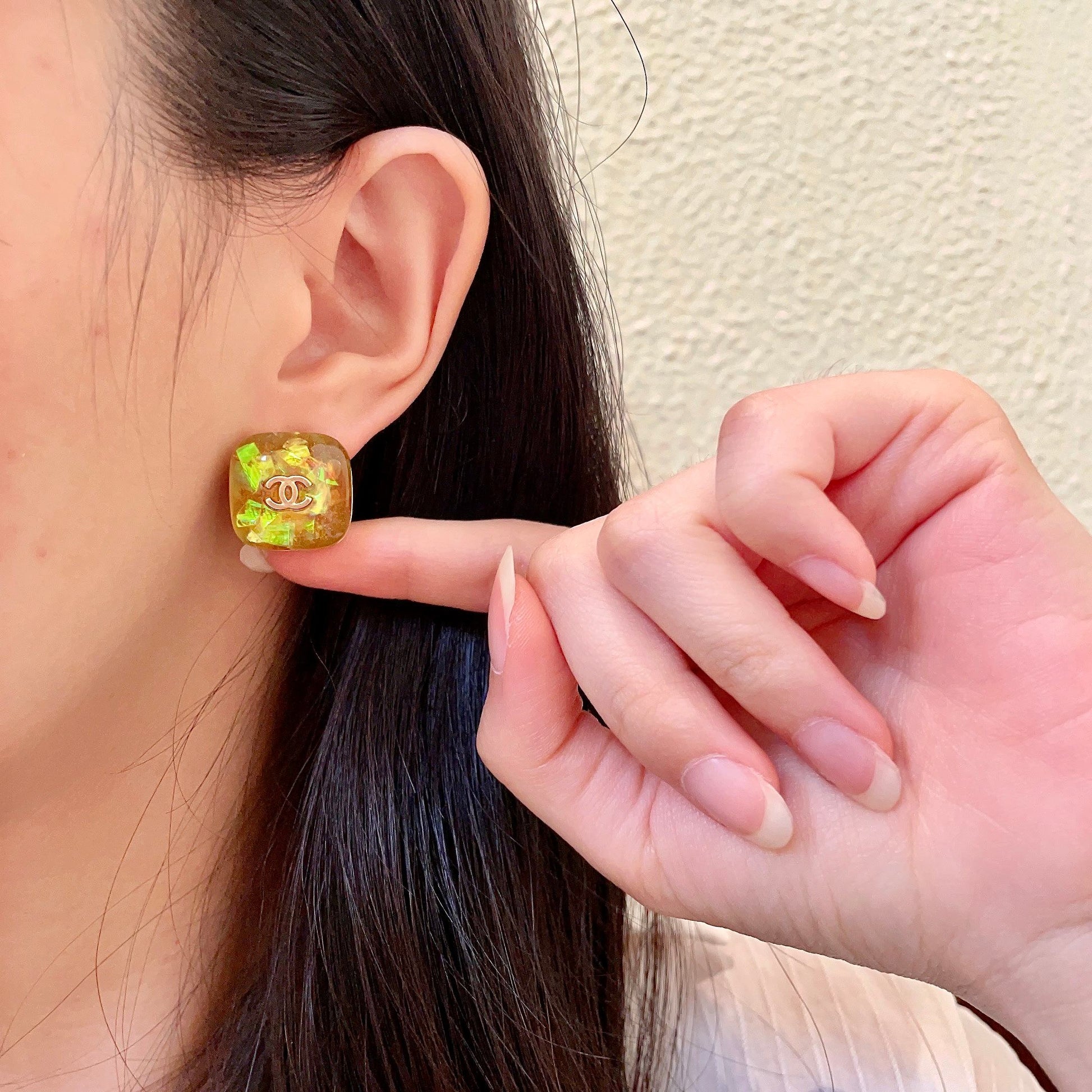 Double-C Emblem Stud Earrings in Polished Metal-Tone – Design 101 front product view