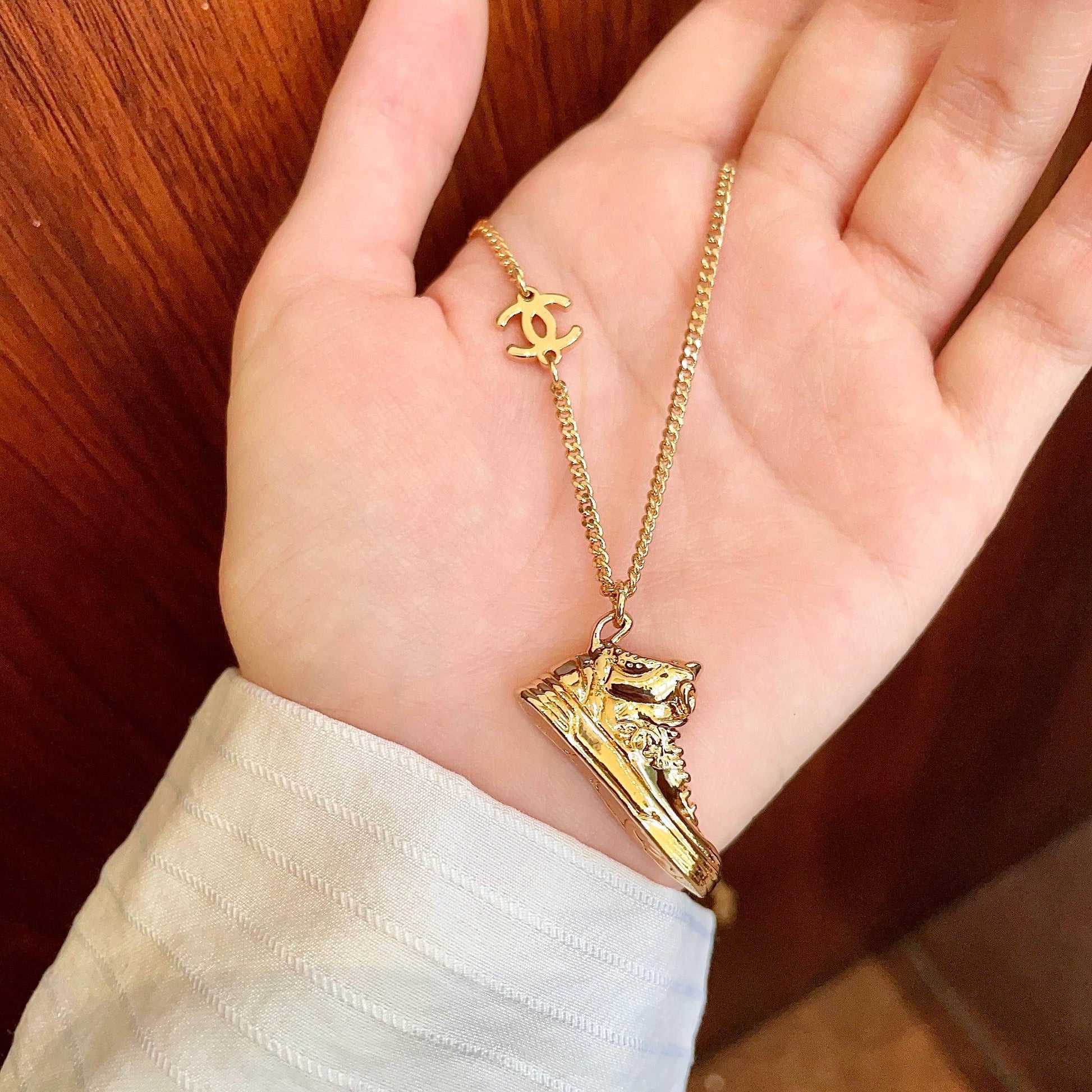 Signature Emblem Pendant Necklace in Polished Metal-Tone – Design 101 side detail