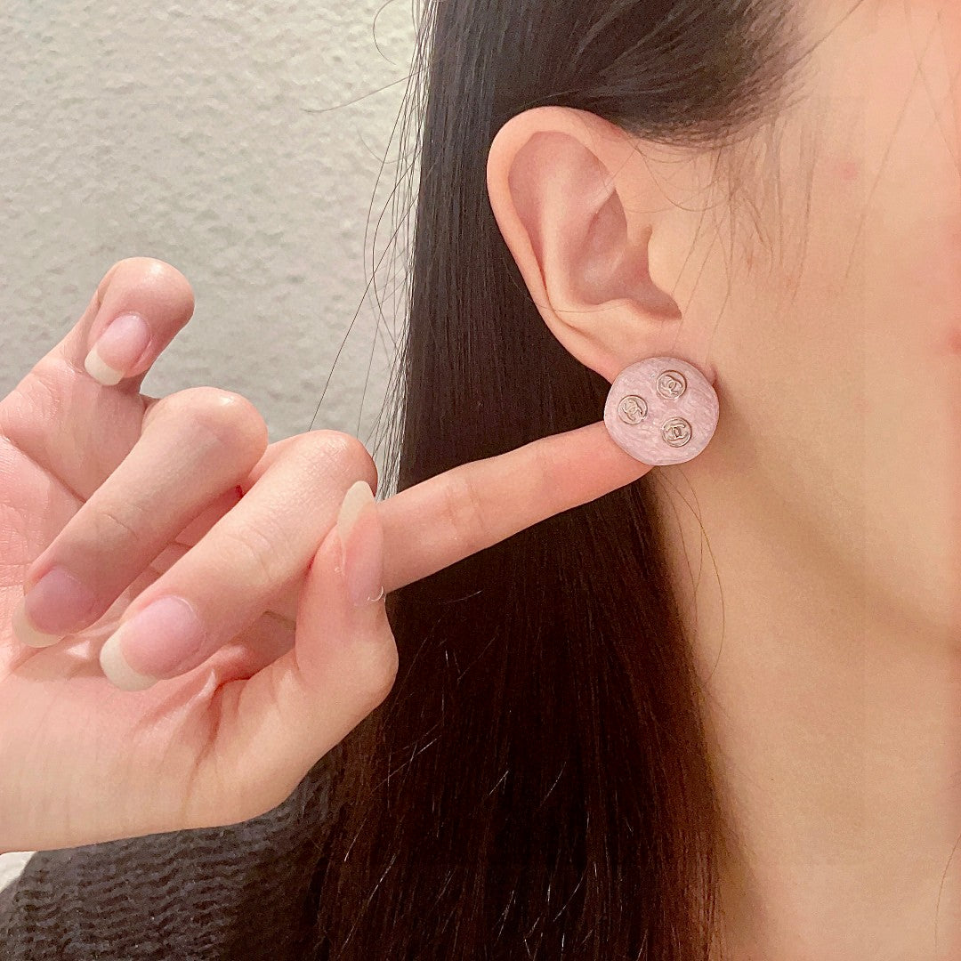 Double-C Emblem Stud Earrings in Polished Metal-Tone – Design 106 front product view
