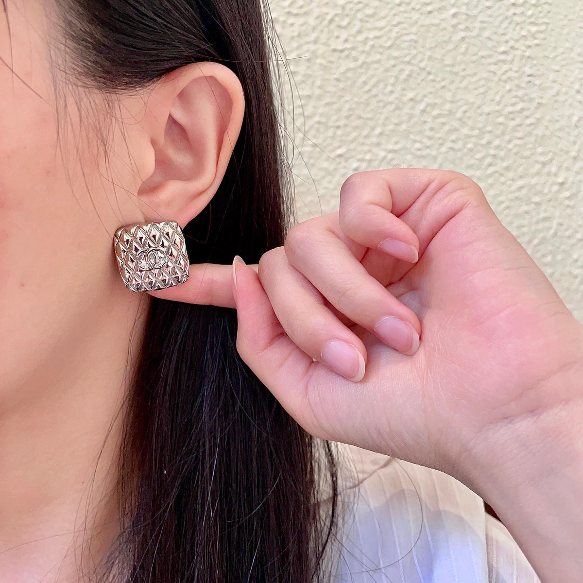 Double-C Emblem Stud Earrings in Polished Metal-Tone – Design 077 front product view