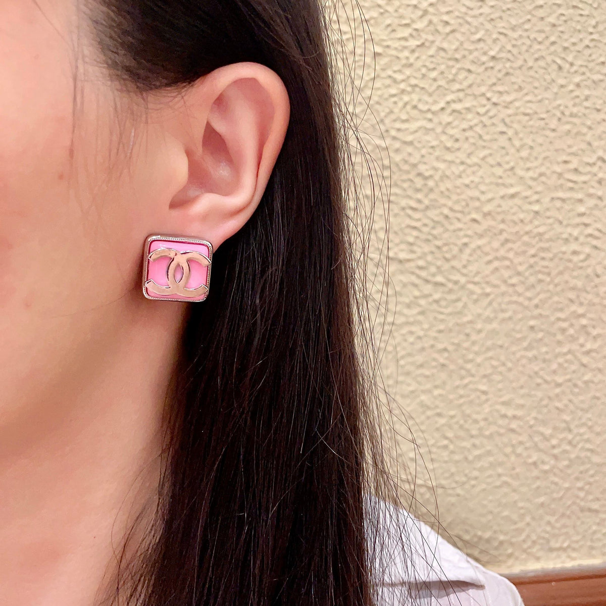 Double-C Emblem Stud Earrings in Polished Metal-Tone – Design 190 detail view