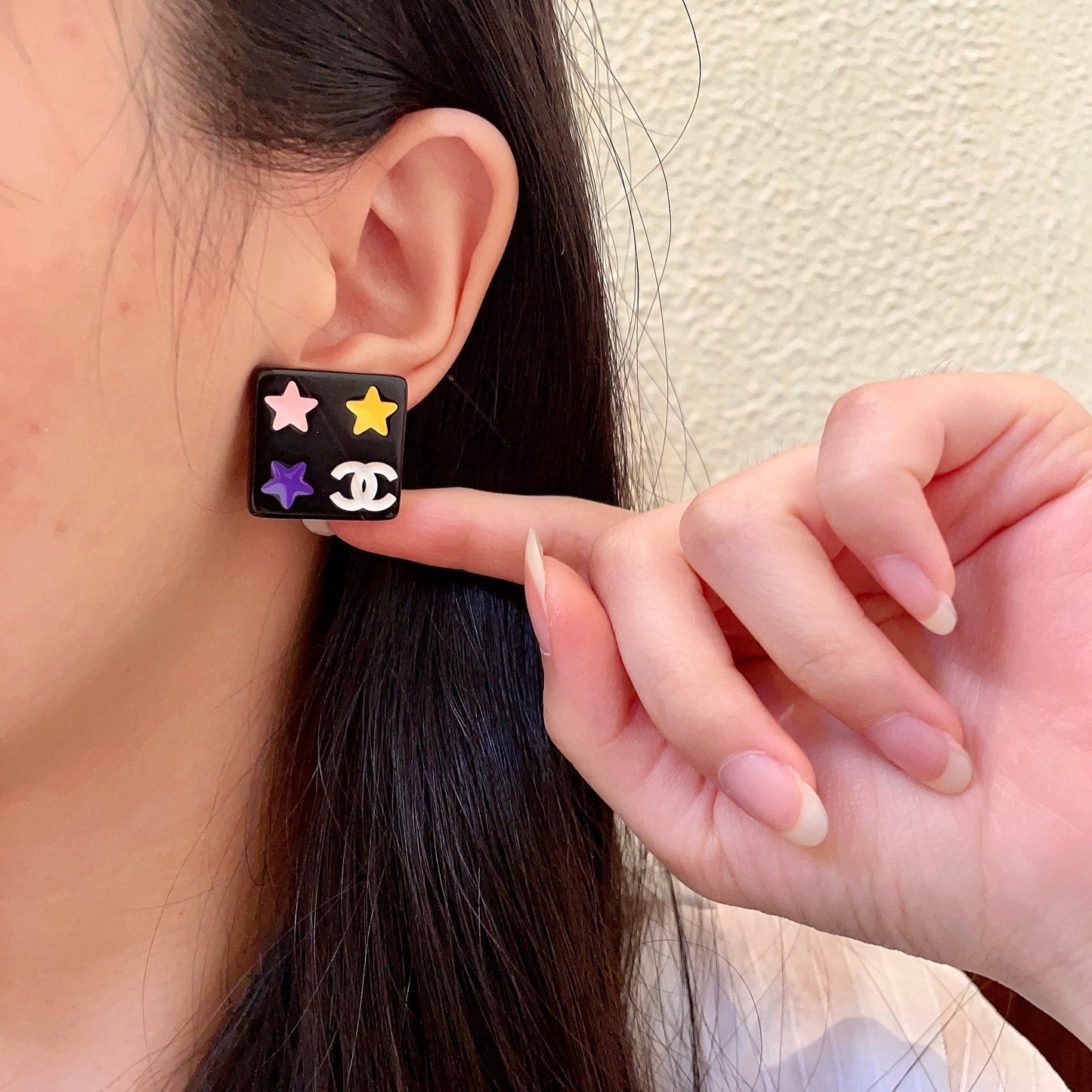 Double-C Emblem Stud Earrings in Polished Metal-Tone – Star Detail – Design 004 front product view
